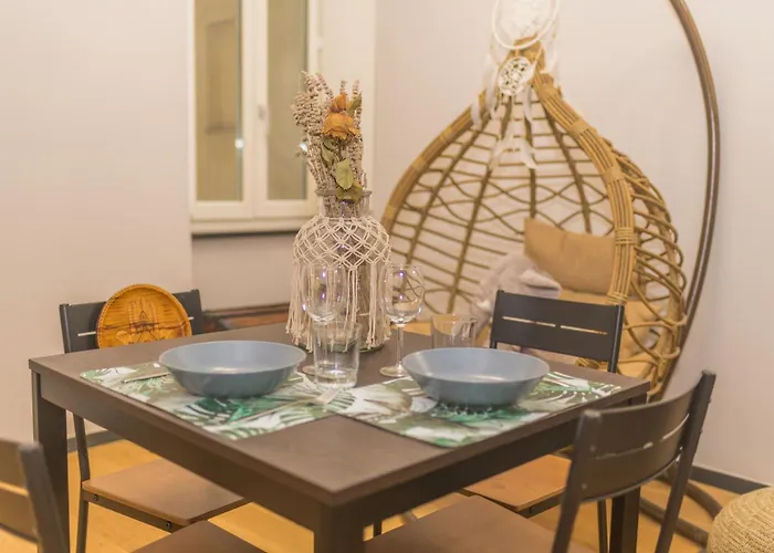 Апартаменты House Of Caruggi